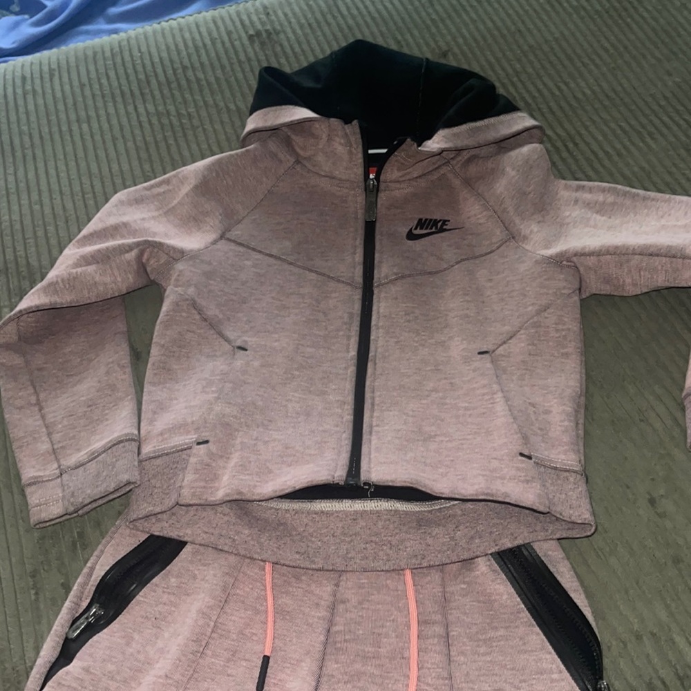 Nike track suit. Worn once size 6.